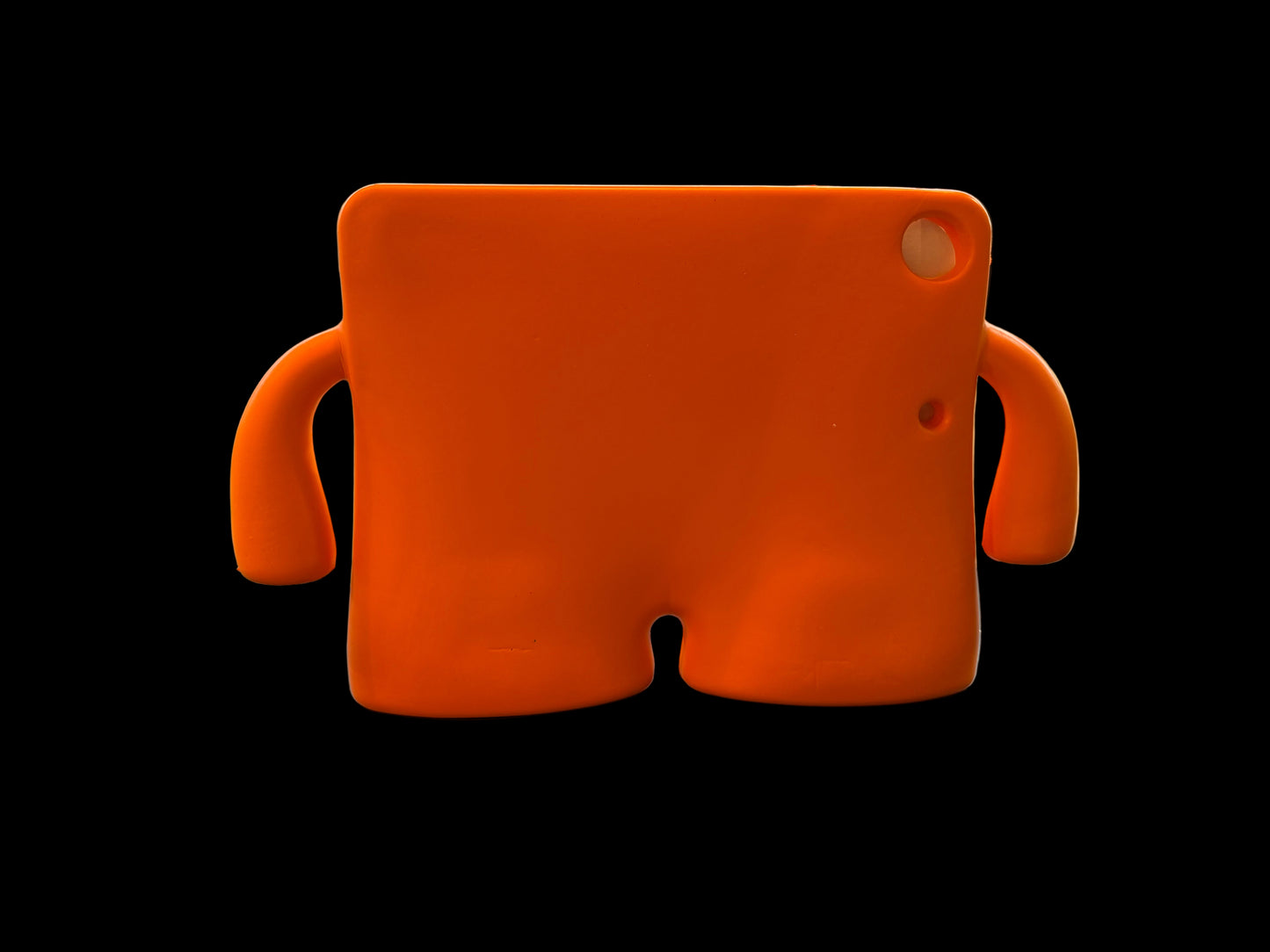 Orange children's tablet case with arm and leg extensions on a table.