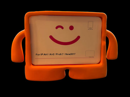Orange stand with a smiley face design on a reflective surface